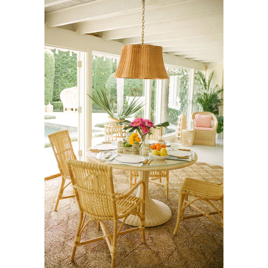 Biscayne Dining Table by Chelsea House in tan. Made from aluminum, rattan in a rustic style.