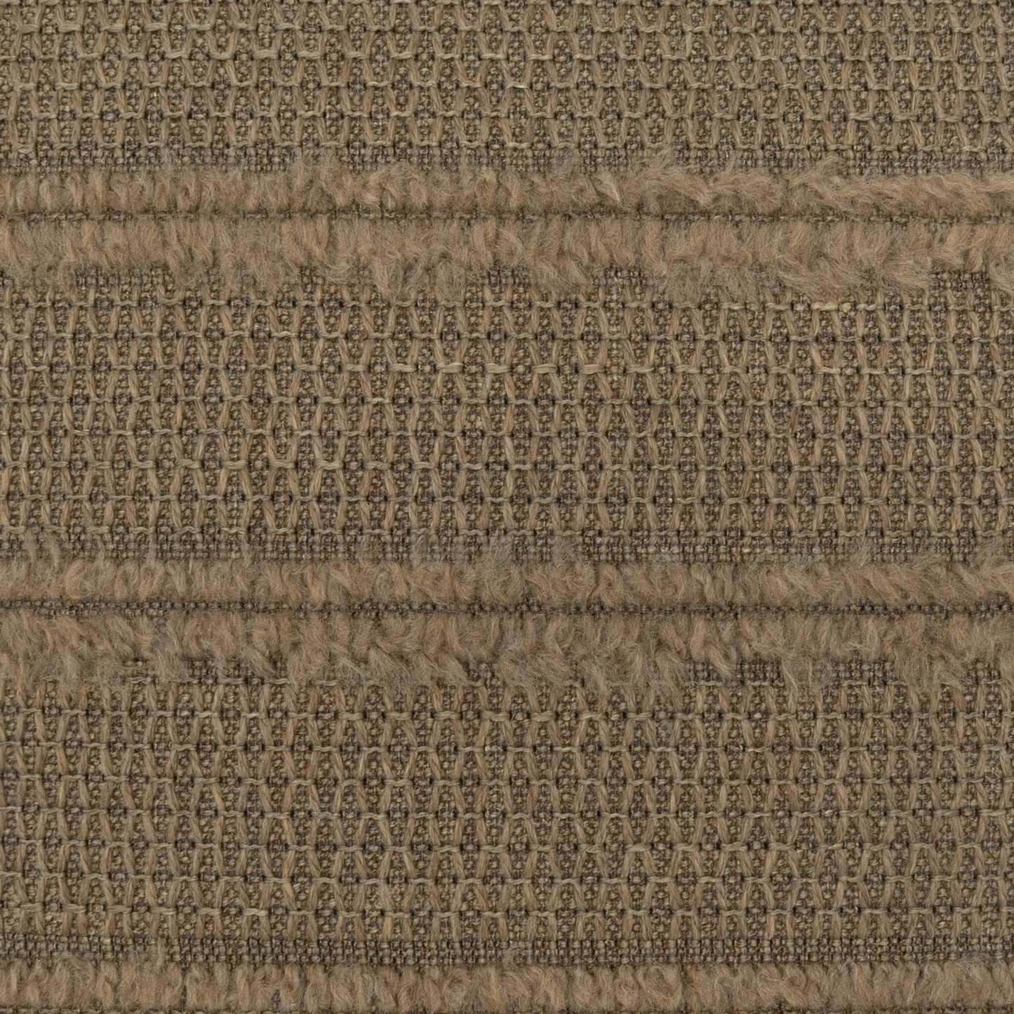 001 SI-2533700 | Closeup | Kitto Pillow by DV Kap Home in mocha. Made from 23% wool, 19% polyester, 18% acrylic, 16% viscose, 16% cotton, 5% polyamide, 3% linen in a unique style.