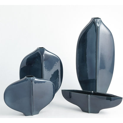 Center Ridge Vase by Global Views in blue. Made from earthenware-reactive glaze in a modern style.