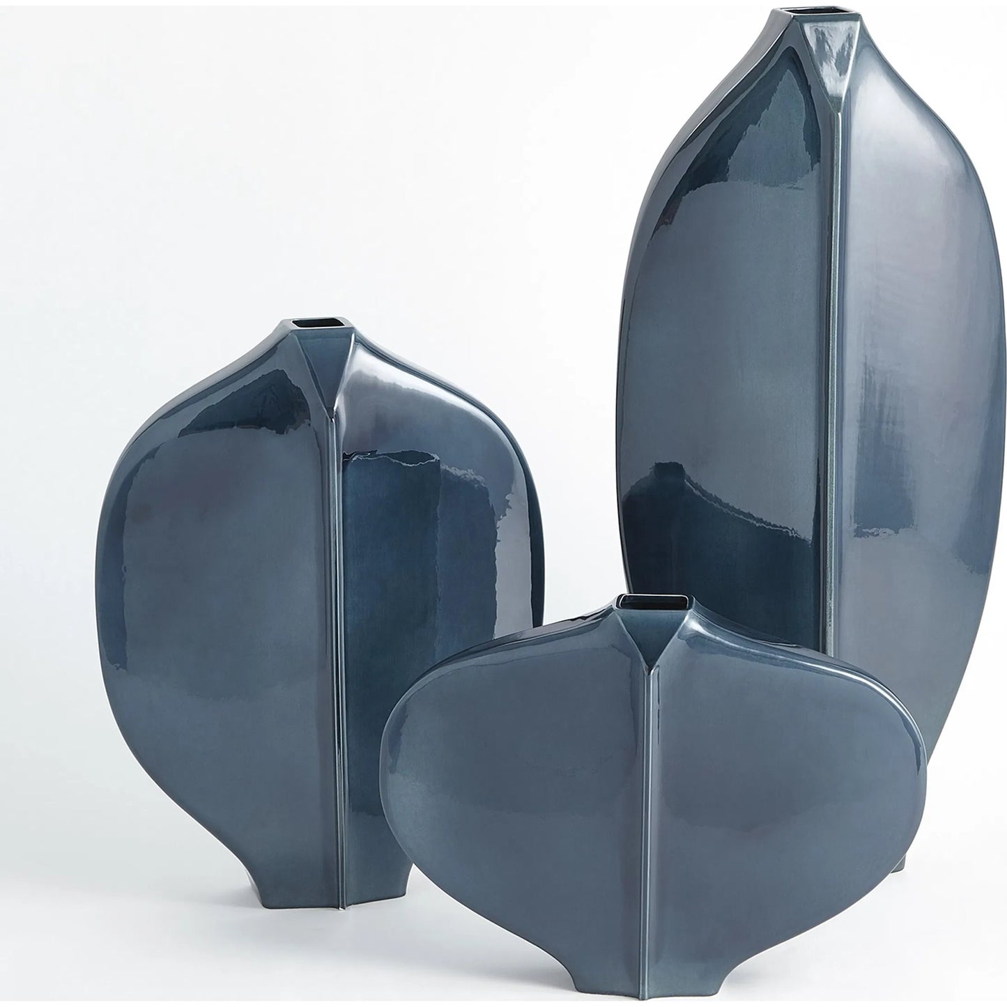 007 SR-891520 | Additional Silo | Center Ridge Vase by Global Views in blue. Made from earthenware-reactive glaze in a modern style.