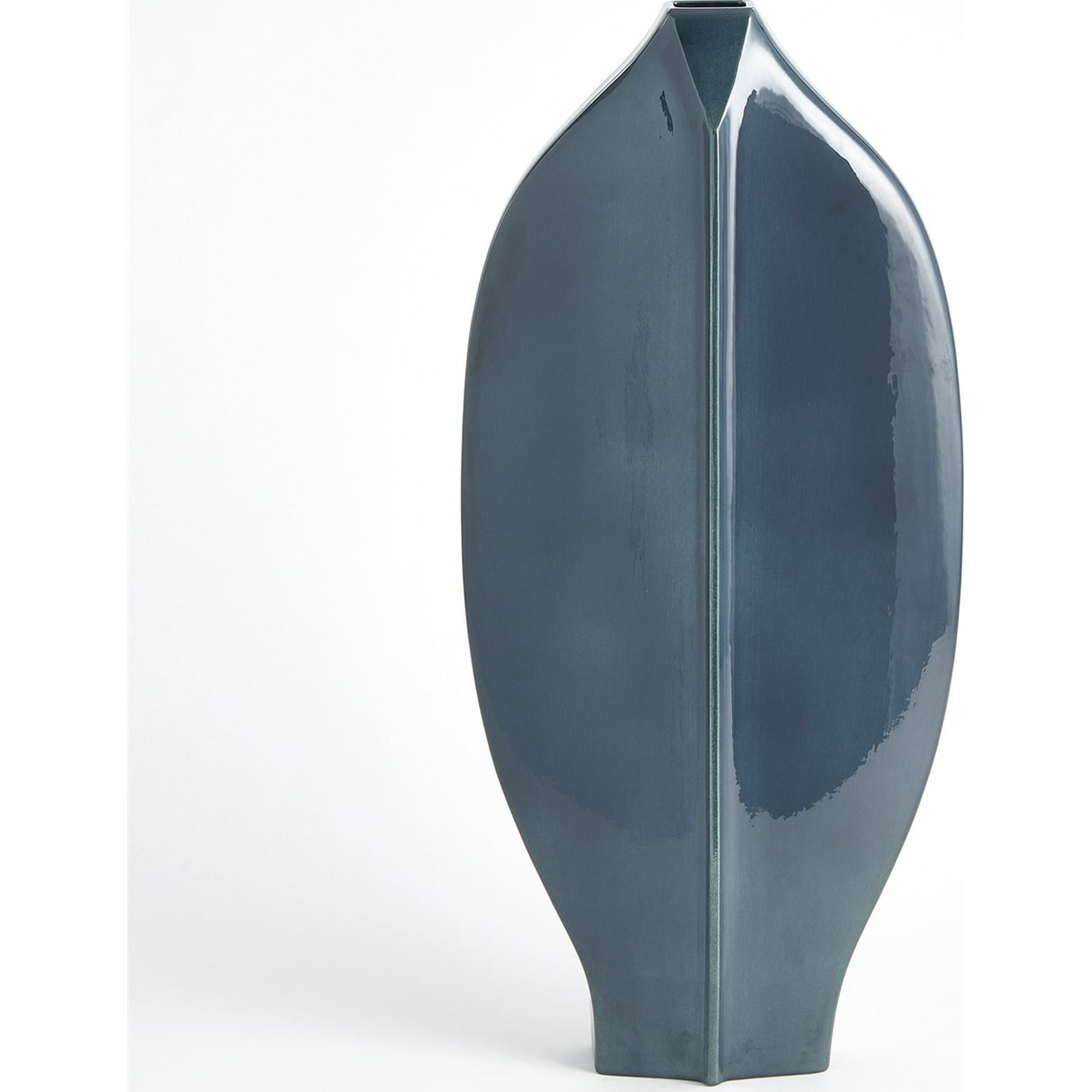 Center Ridge Bowl by Global Views in blue. Made from earthenware-reactive glaze in a modern style.