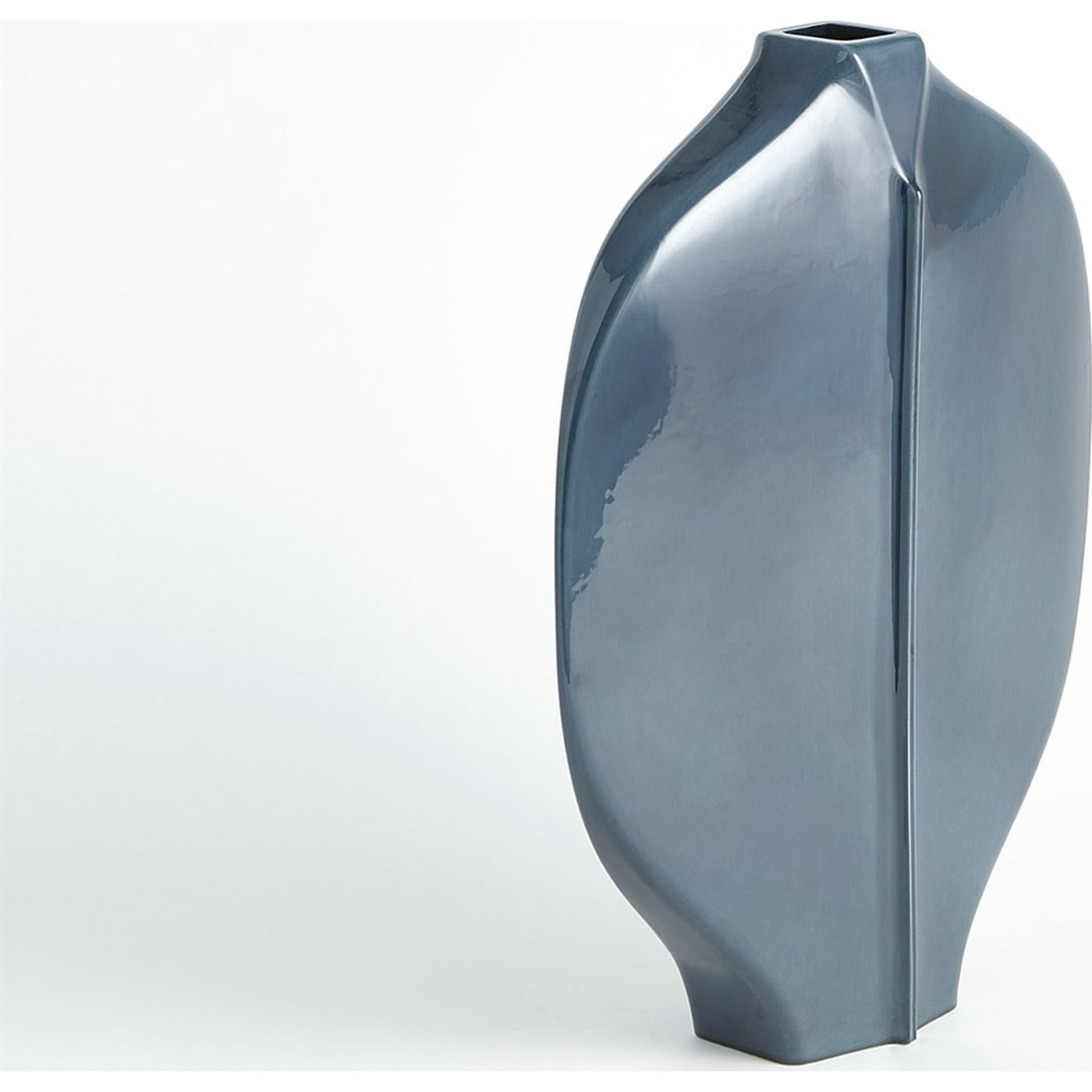 Center Ridge Vase by Global Views in blue. Made from earthenware-reactive glaze in a modern style.
