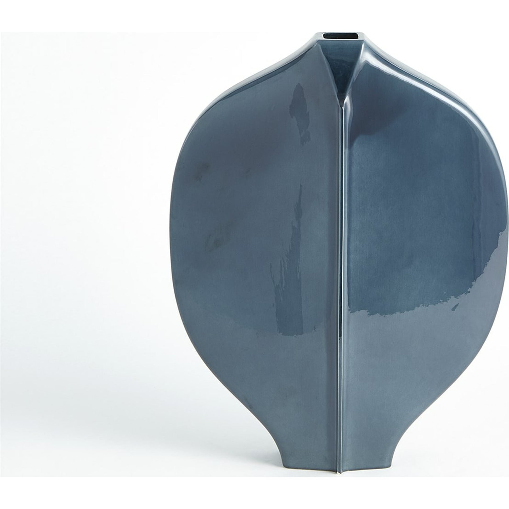 Center Ridge Bowl by Global Views in blue. Made from earthenware-reactive glaze in a modern style.