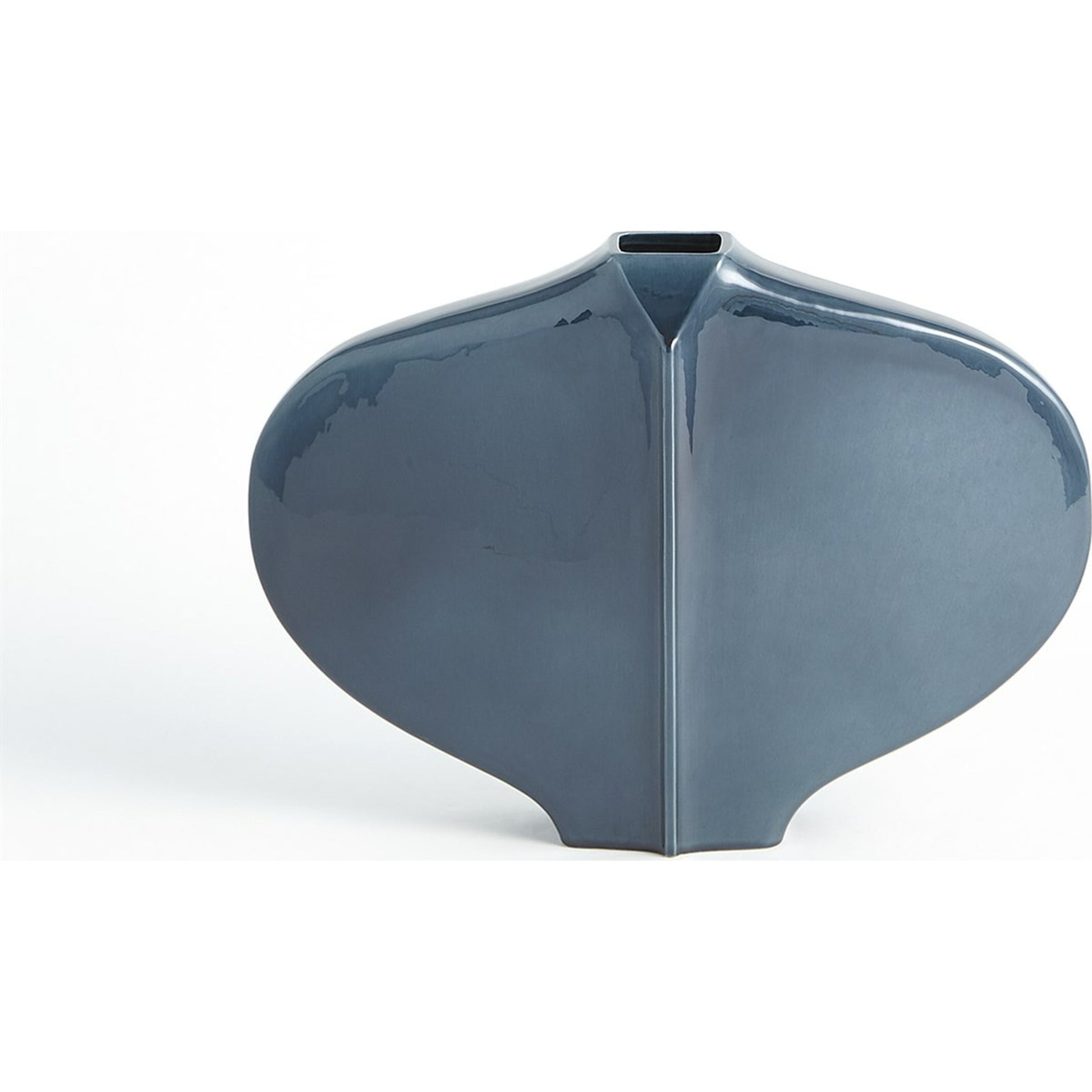 Center Ridge Bowl by Global Views in blue. Made from earthenware-reactive glaze in a modern style.