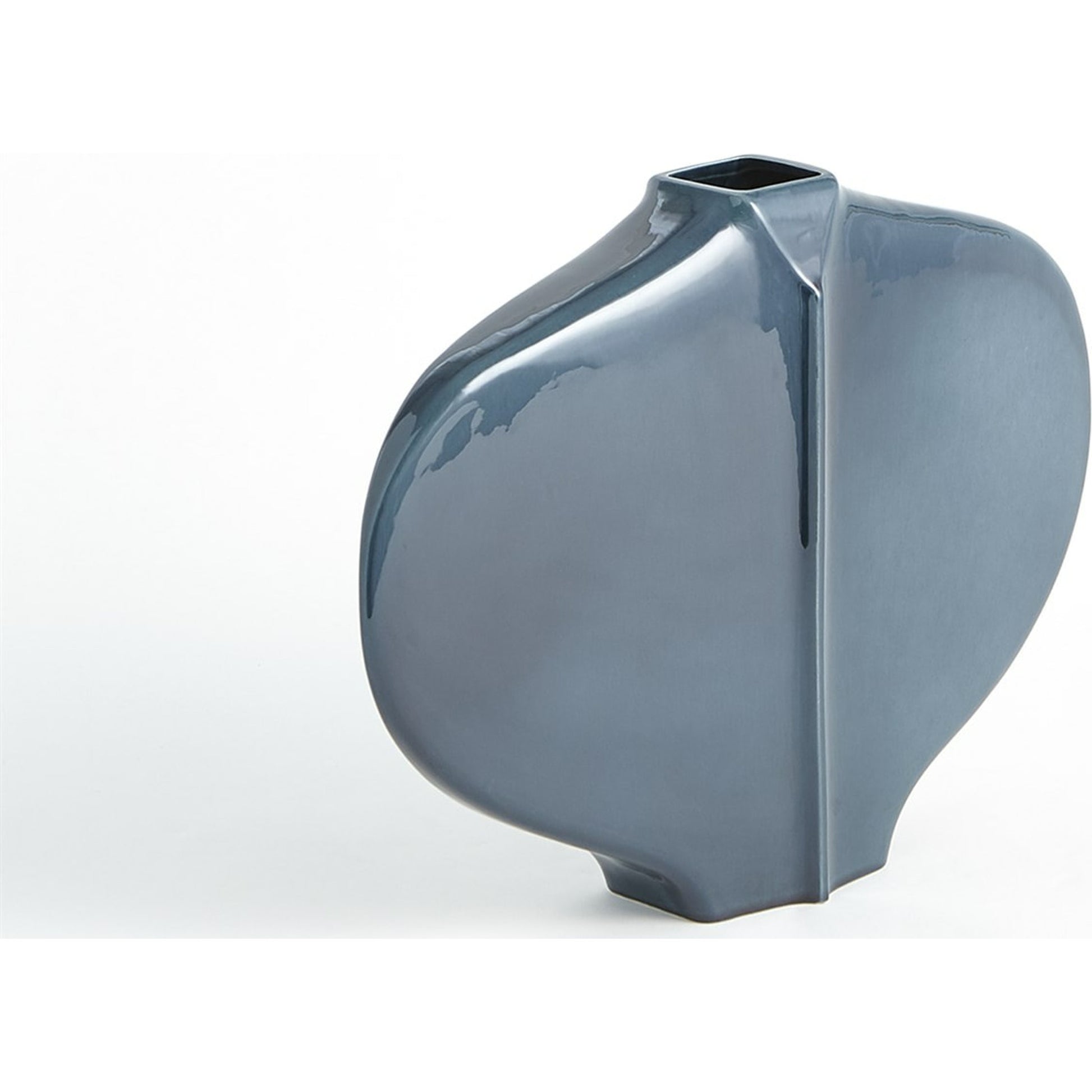 Center Ridge Bowl by Global Views in blue. Made from earthenware-reactive glaze in a modern style.