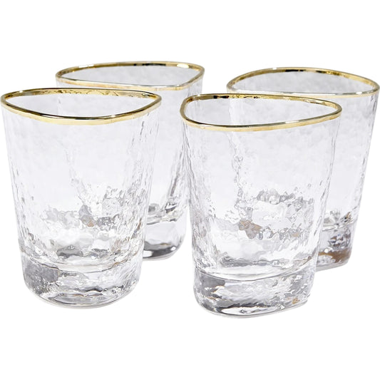 Hammered Water Glasses by Global Views in clear w, gold rim. Made from glass in a transitional style.