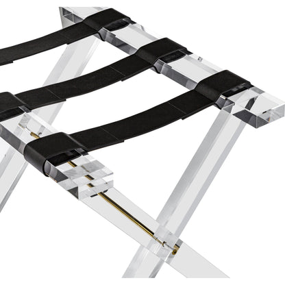 Fritz Luggage Stand by Interlude Home in clear, shiny brass, black. Made from acrylic, stainless steel, leather in a modern style.