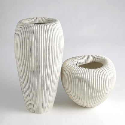 Baleen Cachepot by Global Views in ivory. Made from ceramic in a coastal style.