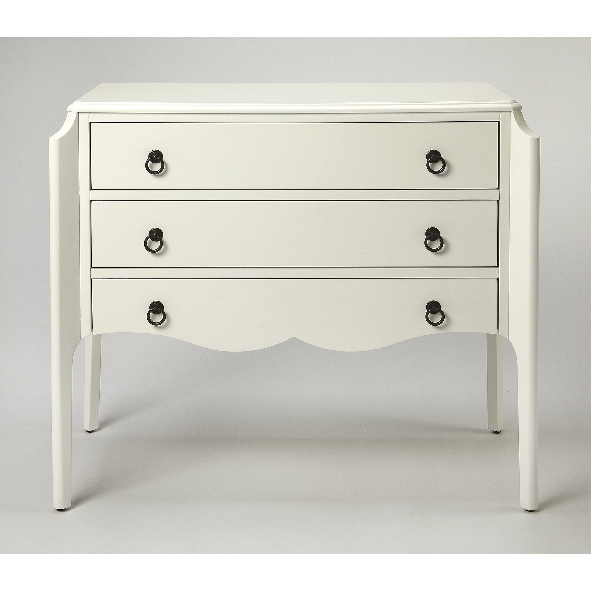 Wilshire Accent Chest by Butler Specialty Company in white and glossy white. Made from rubberwood solids, mdf, oak veneer, antique bronze finished hardware in a transitional style.