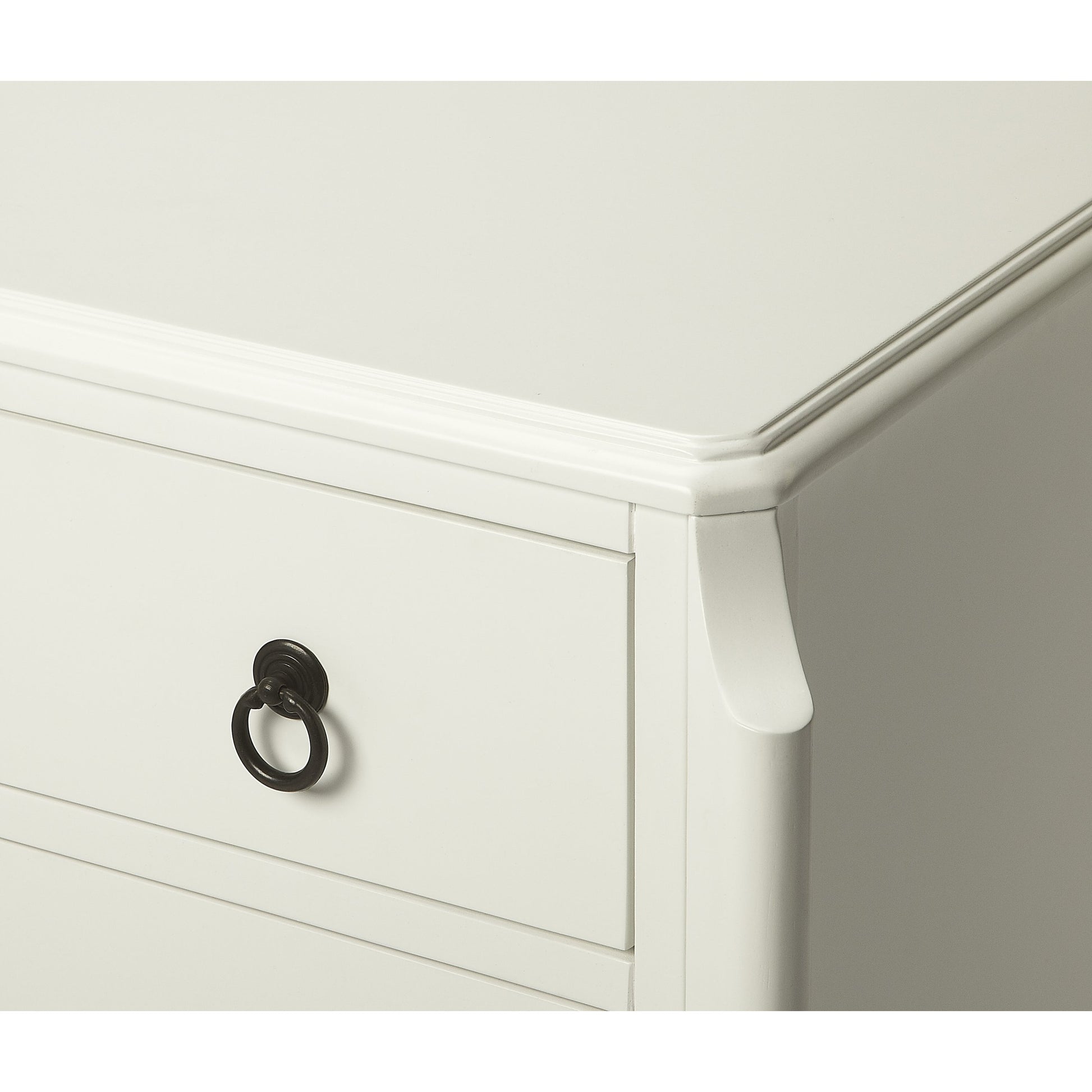 Wilshire Accent Chest by Butler Specialty Company in white and glossy white. Made from rubberwood solids, mdf, oak veneer, antique bronze finished hardware in a transitional style.