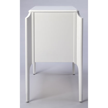 Wilshire Accent Chest by Butler Specialty Company in white and glossy white. Made from rubberwood solids, mdf, oak veneer, antique bronze finished hardware in a transitional style.