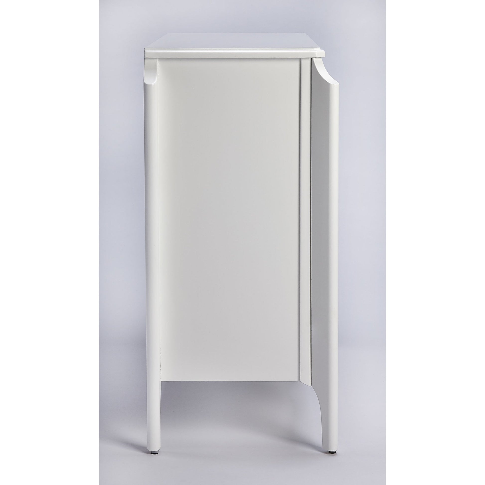Wilshire Bookcase by Butler Specialty Company in white and glossy white. Made from rubberwood solids, oak veneers, mdf in a transitional style.