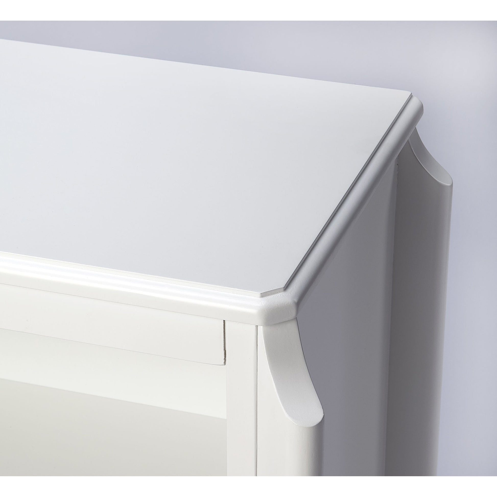 Wilshire Bookcase by Butler Specialty Company in white and glossy white. Made from rubberwood solids, oak veneers, mdf in a transitional style.