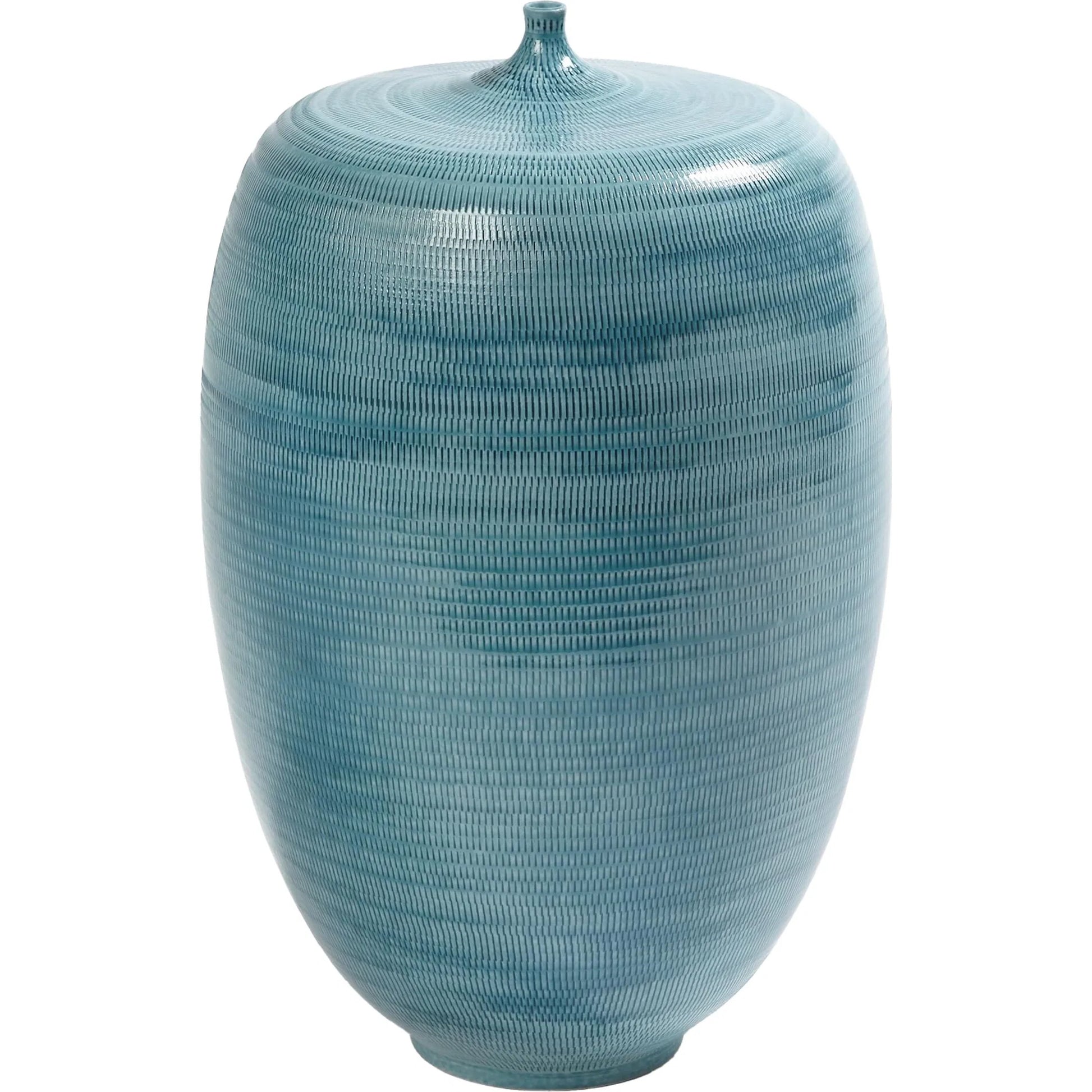 Fat Bottle by Global Views. Made from porcelain in a coastal style.