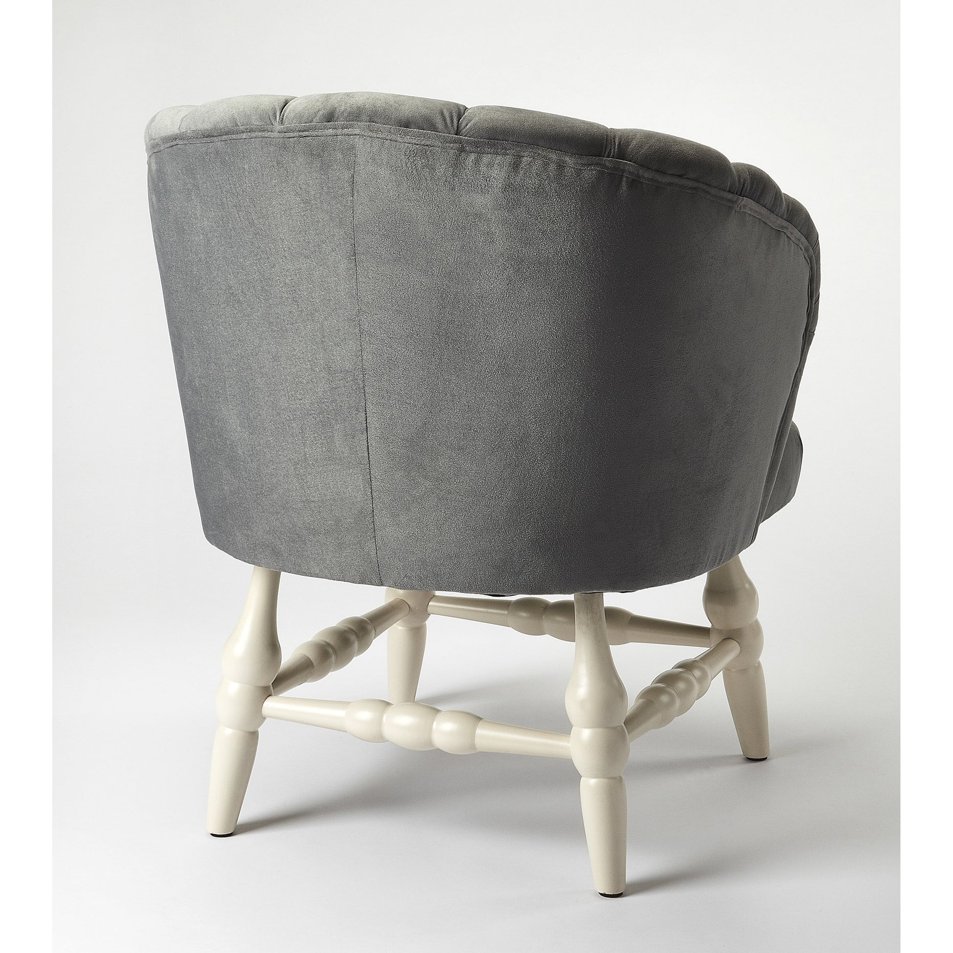 Malcom Accent Chair by Butler Specialty Company in gray and white. Made from rubberwood solids, pine board, 2lb. foam, velvet fabric (100% polyester) in a transitional style.