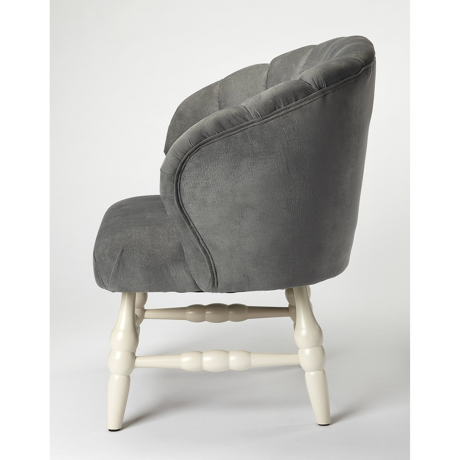 Malcom Accent Chair by Butler Specialty Company in gray and white. Made from rubberwood solids, pine board, 2lb. foam, velvet fabric (100% polyester) in a transitional style.