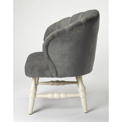 Malcom Accent Chair by Butler Specialty Company in gray and white. Made from rubberwood solids, pine board, 2lb. foam, velvet fabric (100% polyester) in a transitional style.