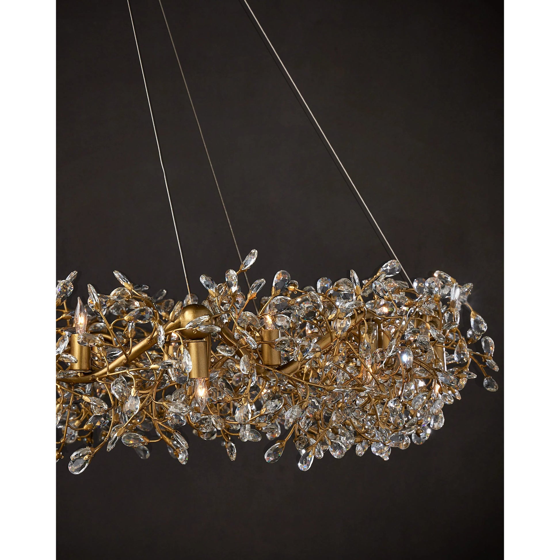 Crystal Bud Ring Chandelier by Currey and Company in clear, brass. Made from crystal, wrought iron in a modern style.