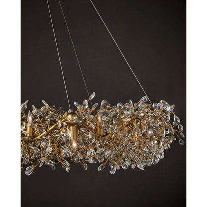 Crystal Bud Ring Chandelier by Currey and Company in clear, brass. Made from crystal, wrought iron in a modern style.