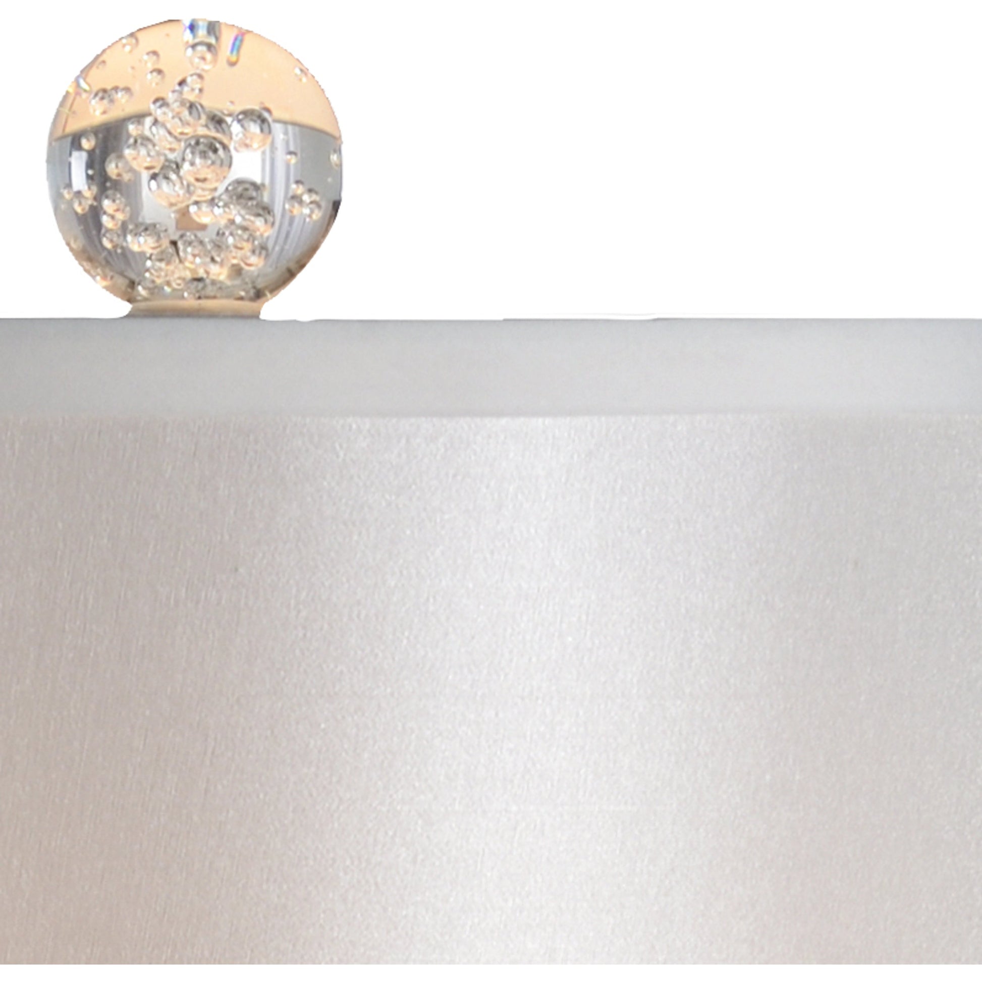 Iceland Lamp by Wildwood in clear, seeded, polished nickel. Made from other: metal in a modern style.