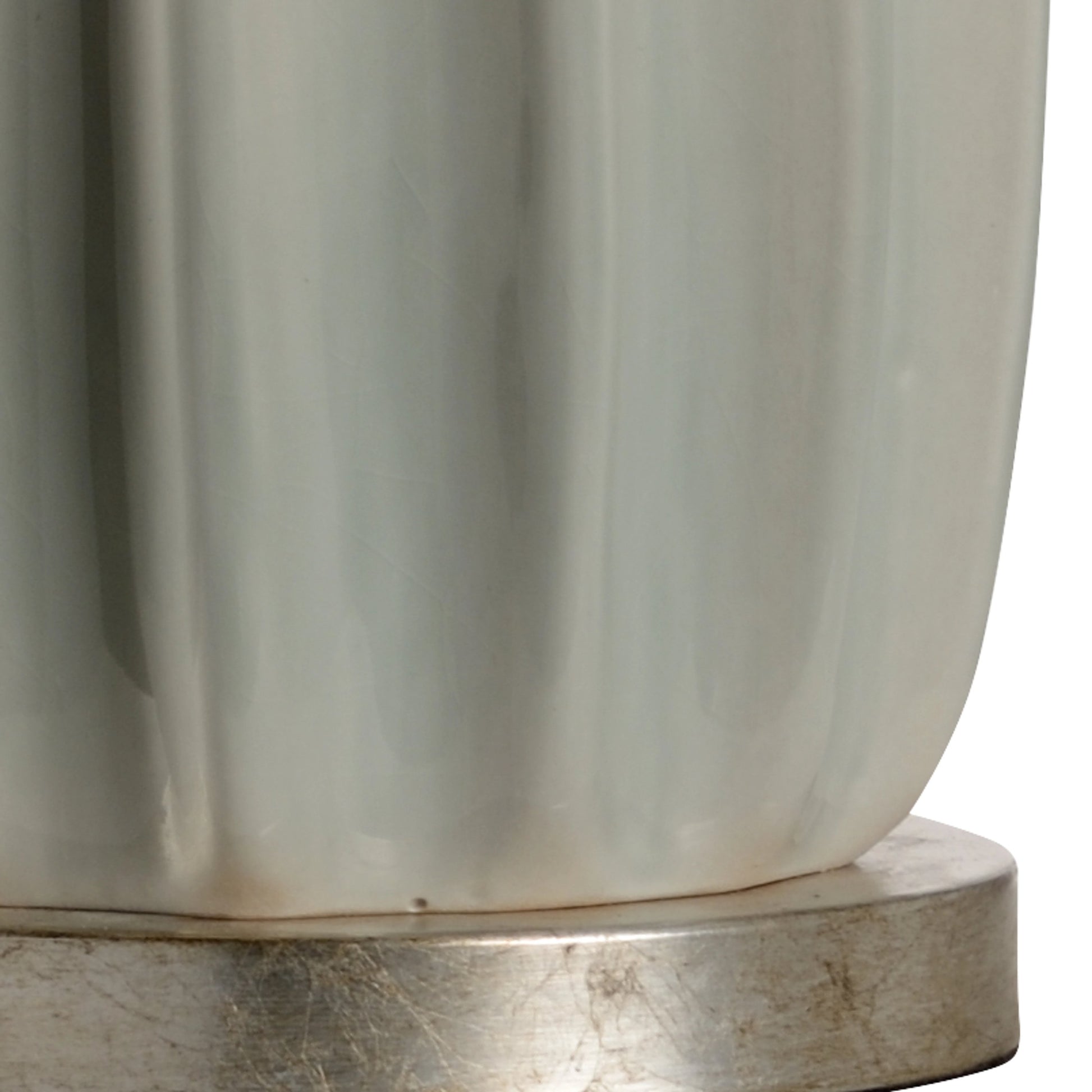 Estelle Lamp by Wildwood in sage green glaze, antique silver leaf. Made from ceramic, porcelain in a modern style.