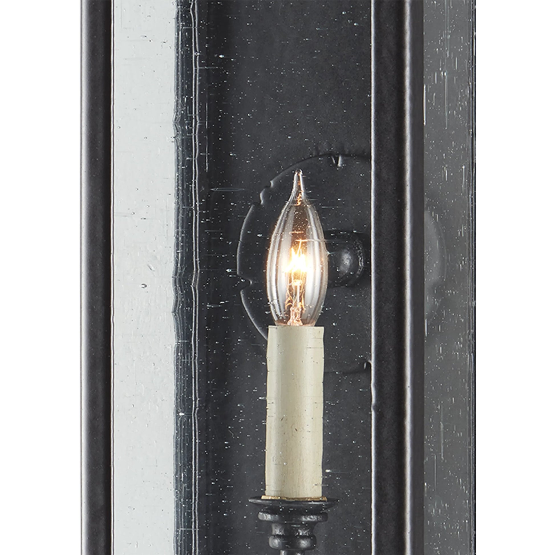 Giatti Outdoor Wall Sconce by Currey and Company in midnight (pure black). Made from wrought iron, glass in a traditional style.