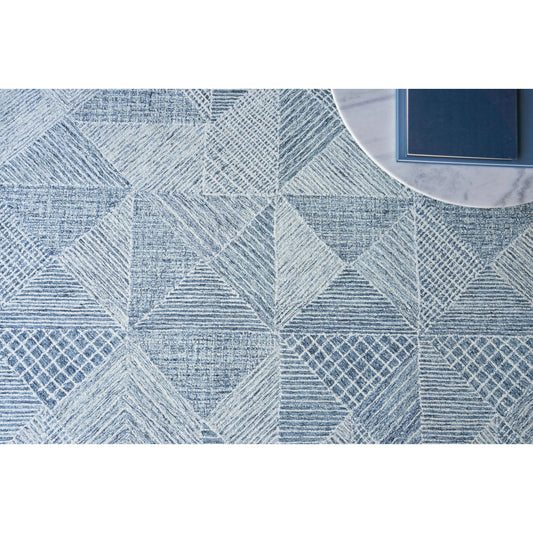 Caprice 4755 Rug by Exquisite Rugs in navy blue, ivory. Made from new zealand wool in a unique style.