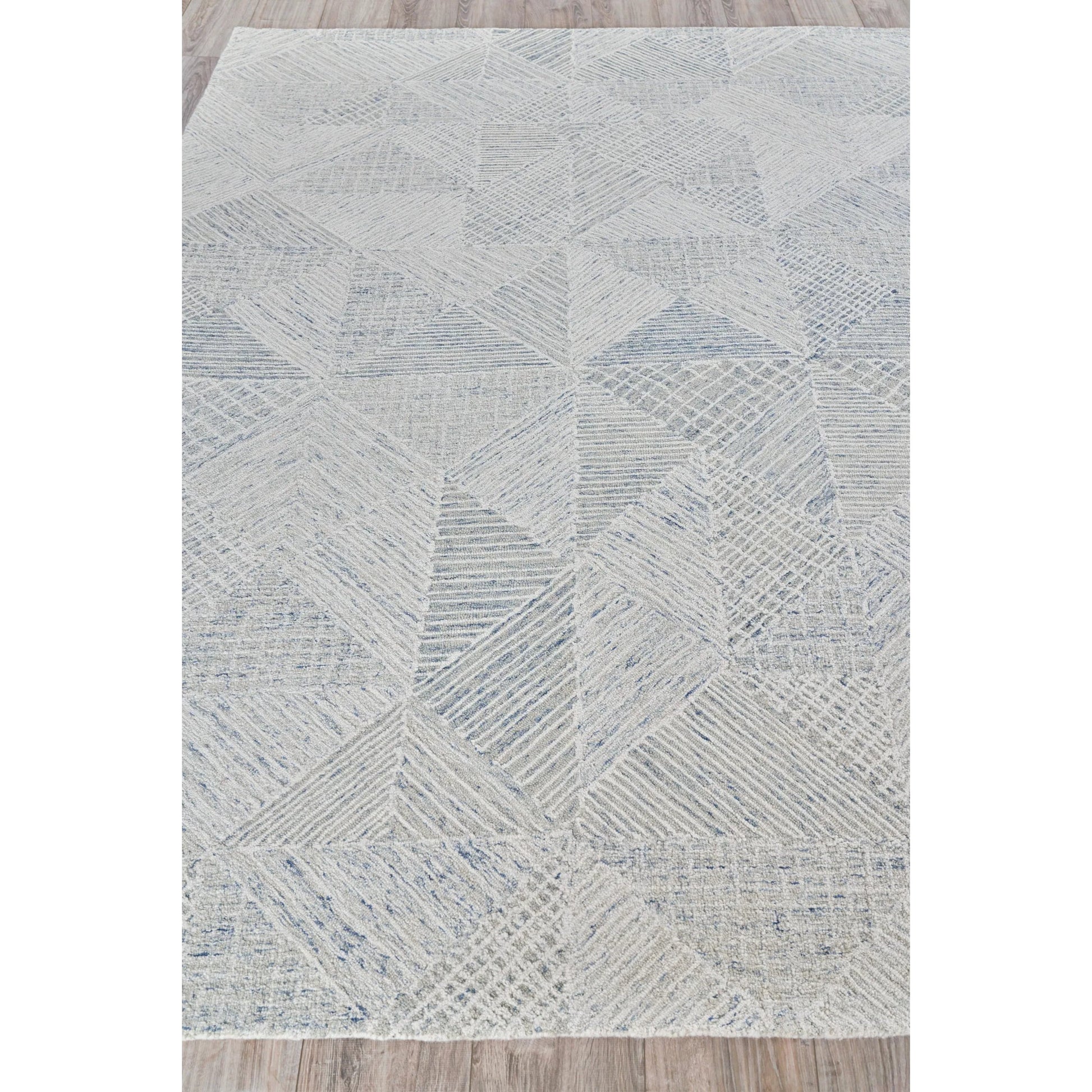 Caprice 4761 Rug by Exquisite Rugs in light blue, ivory. Made from new zealand wool in a unique style.
