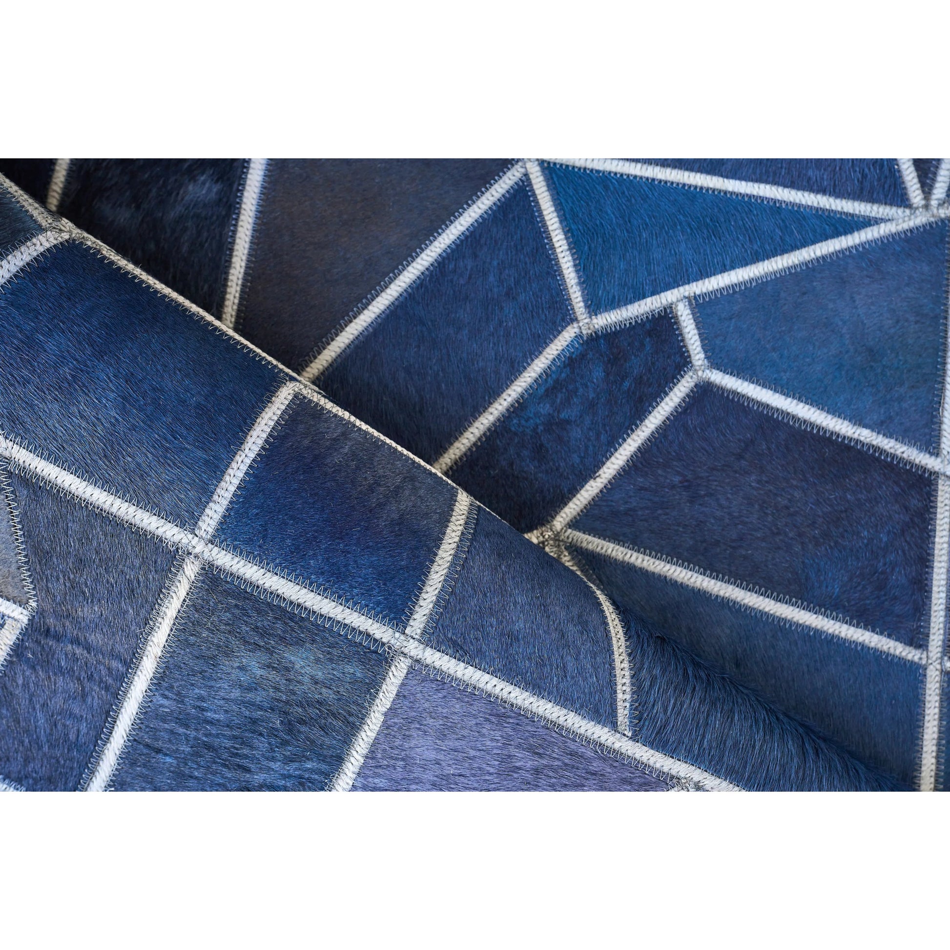 Natural Hide 4780 Rug by Exquisite Rugs in blue, ivory. Made from leather hide in a unique style.