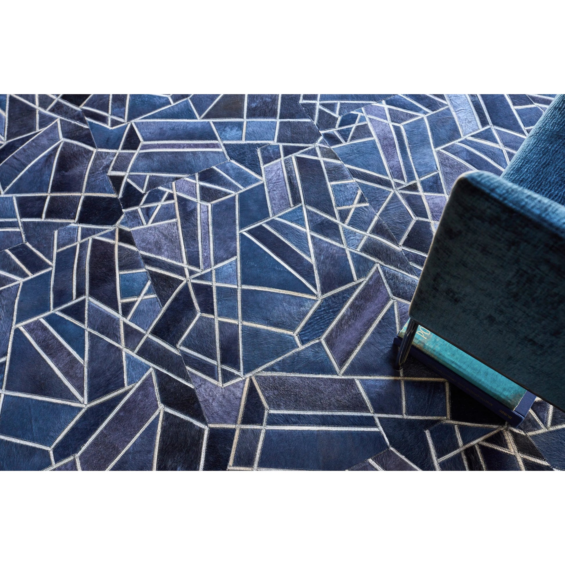 Natural Hide 4780 Rug by Exquisite Rugs in blue, ivory. Made from leather hide in a unique style.