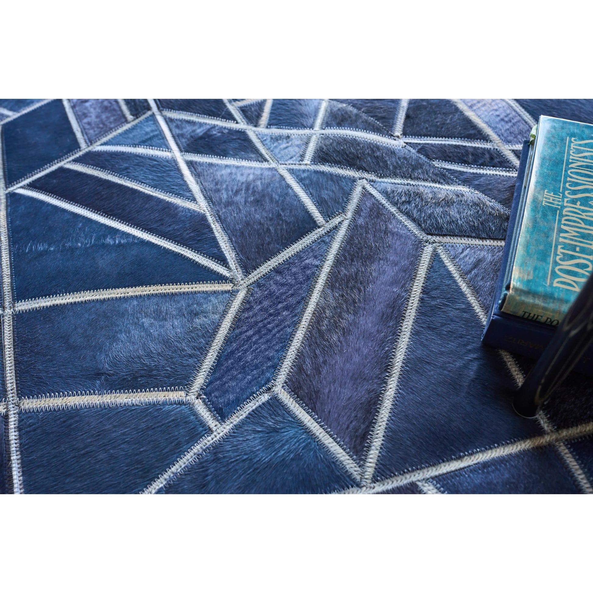 Natural Hide 4780 Rug by Exquisite Rugs in blue, ivory. Made from leather hide in a unique style.