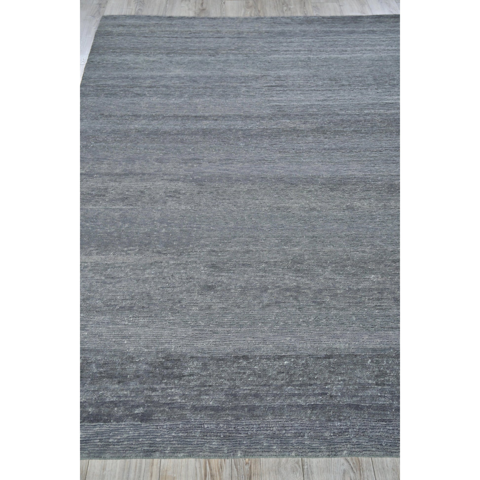 Merino Wool 4805 Rug by Exquisite Rugs in dark gray. Made from merino wool in a unique style.