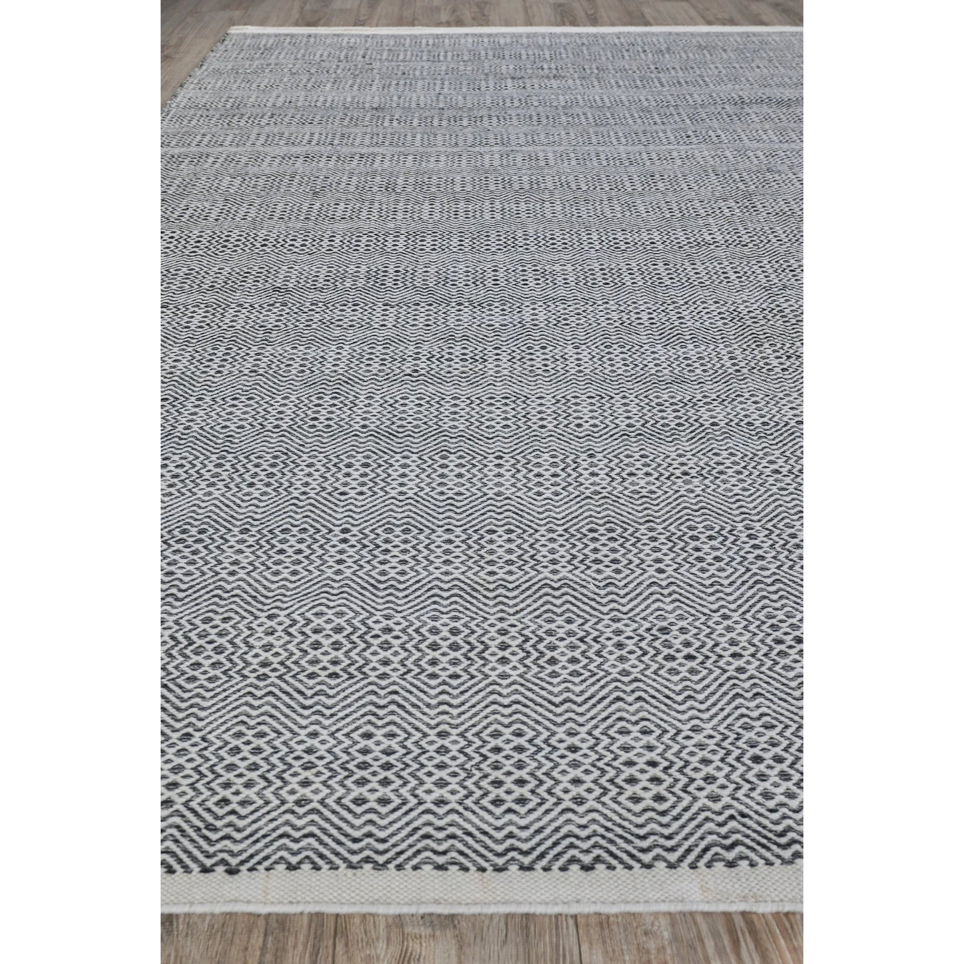 Echo Rug by Exquisite Rugs. Made from pet yarn in a unique style.