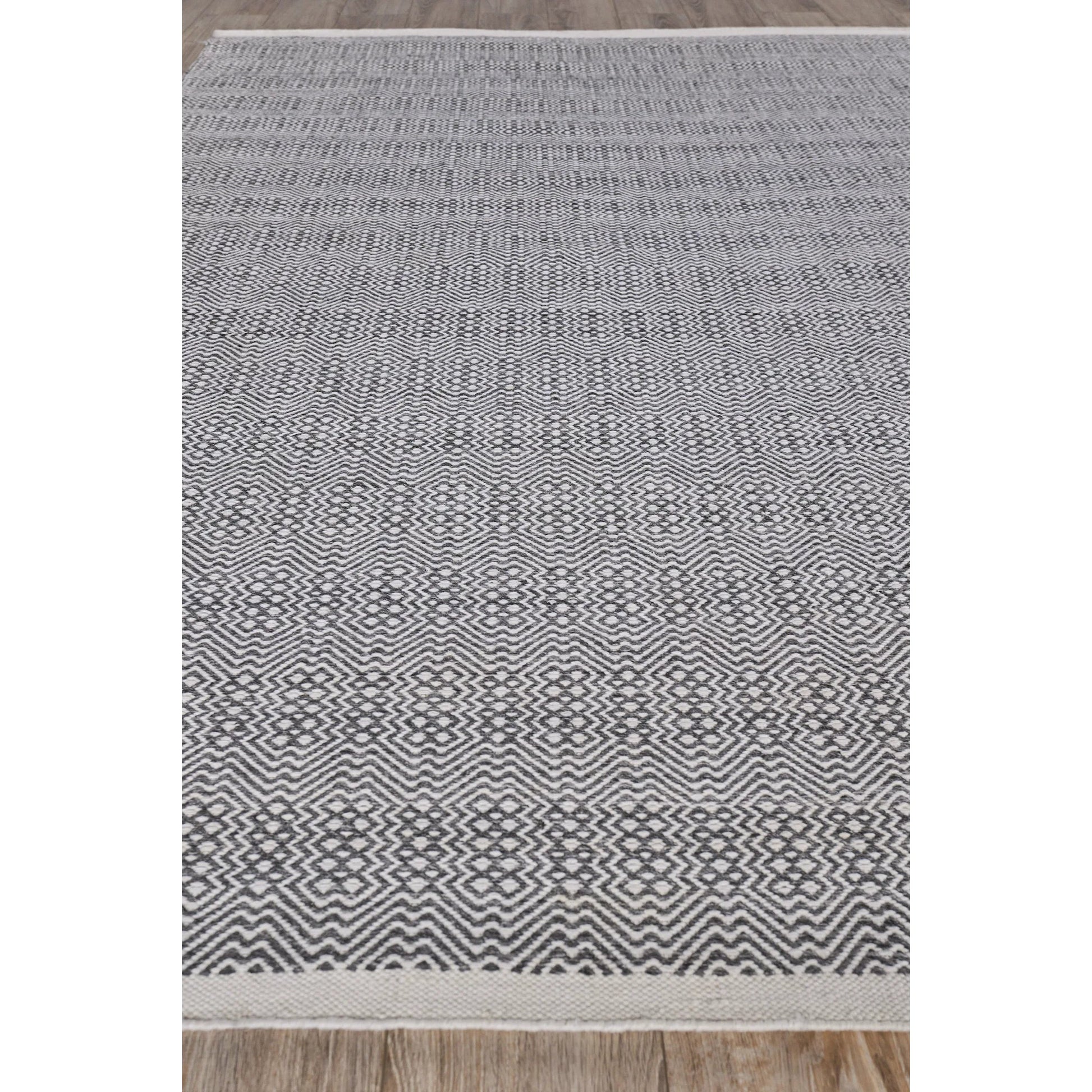 Echo Rug by Exquisite Rugs. Made from pet yarn in a unique style.