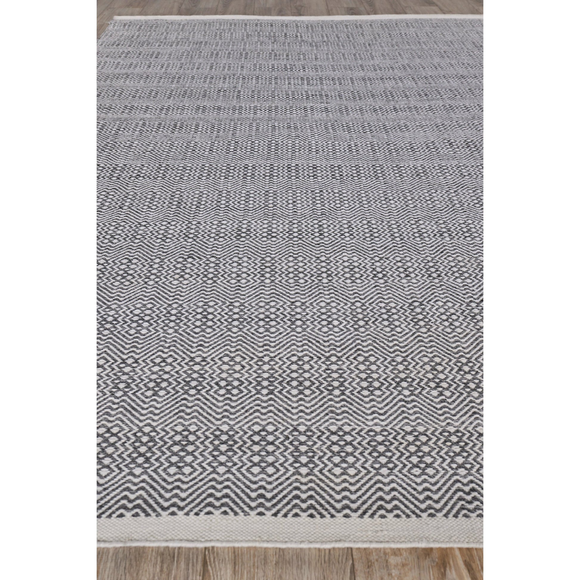 Echo Rug by Exquisite Rugs. Made from pet yarn in a unique style.
