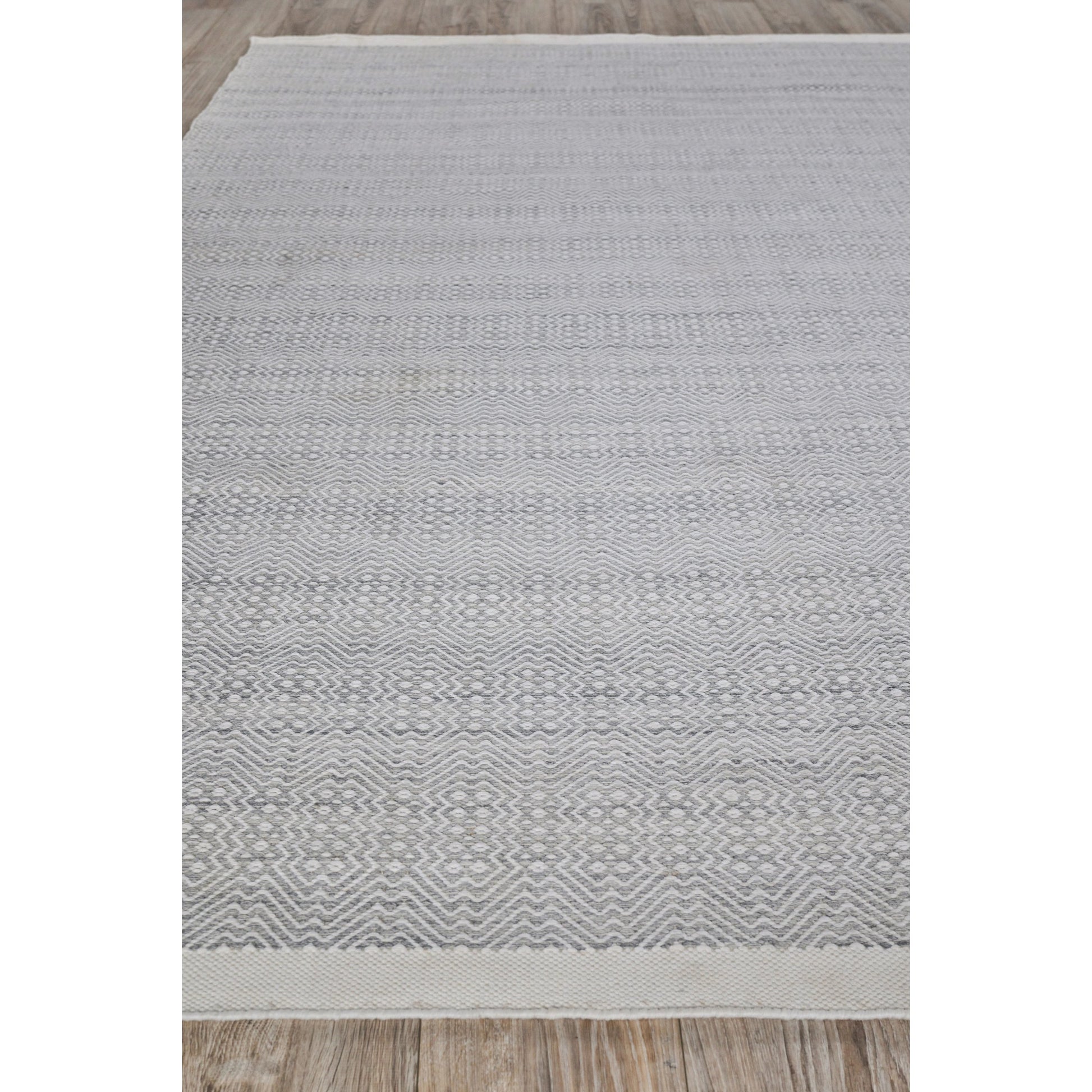 Echo Rug by Exquisite Rugs. Made from pet yarn in a unique style.