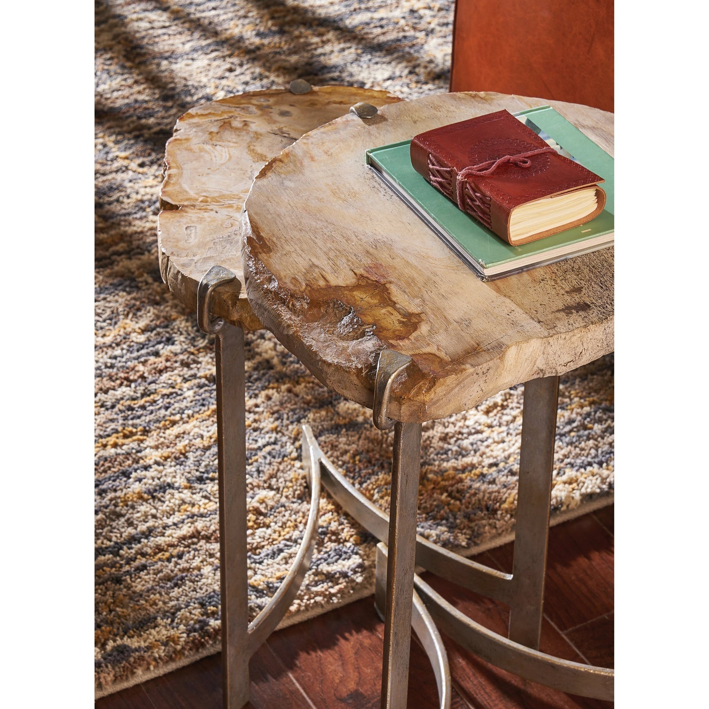 004 SR-384808 | Lifestyle | Bedrock Nested Tables by Wildwood in natural, antique silver leaf. Made from petrified wood in a modern style.