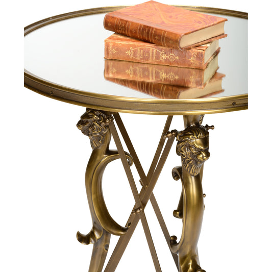 Lion in the Library Table by Wildwood in gold. Made from brass/glass in a modern style.