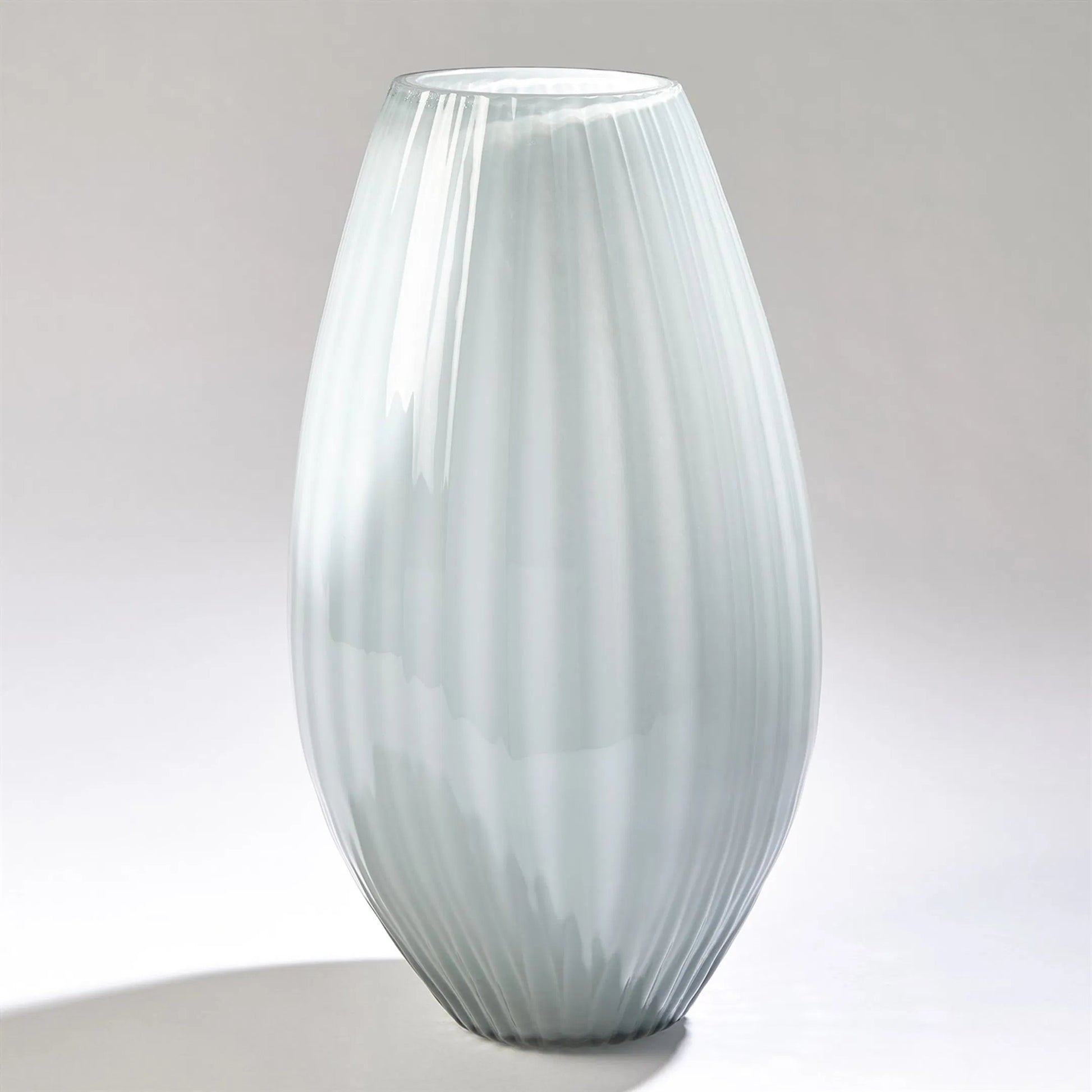 Cased Glass Stripe Vase by Global Views in blue. Made from unique in a modern style.