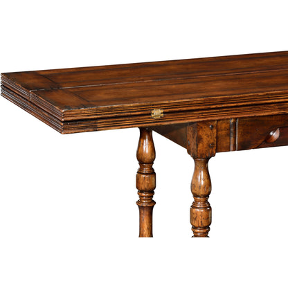 Casual Accents Small Walnut Hunt Table by Jonathan Charles in brown and medium walnut country distressed. Made from acacia in a traditional style.