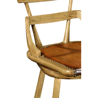 Buckingham Oak Studded Leather Barstool by Jonathan Charles in brown and dark brown tudor oak. Made from oak in a rustic style.