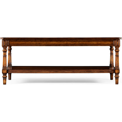Casual Accents Victorian Style Walnut Cocktail Table by Jonathan Charles in medium walnut. Made from acacia in a traditional style.