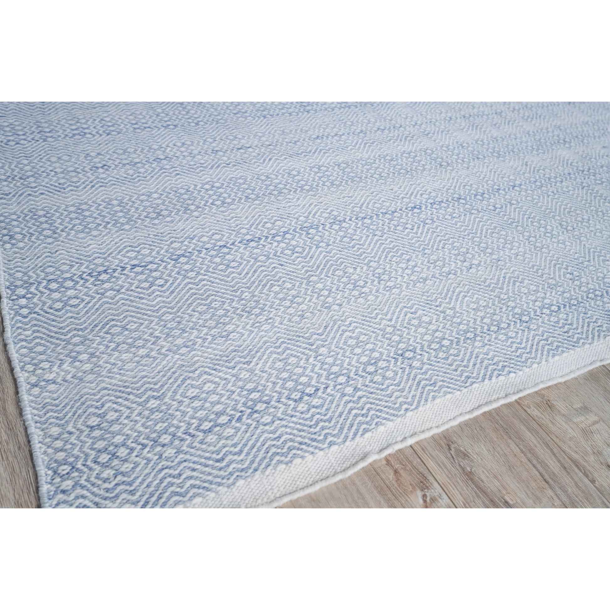Echo Rug by Exquisite Rugs. Made from pet yarn in a unique style.
