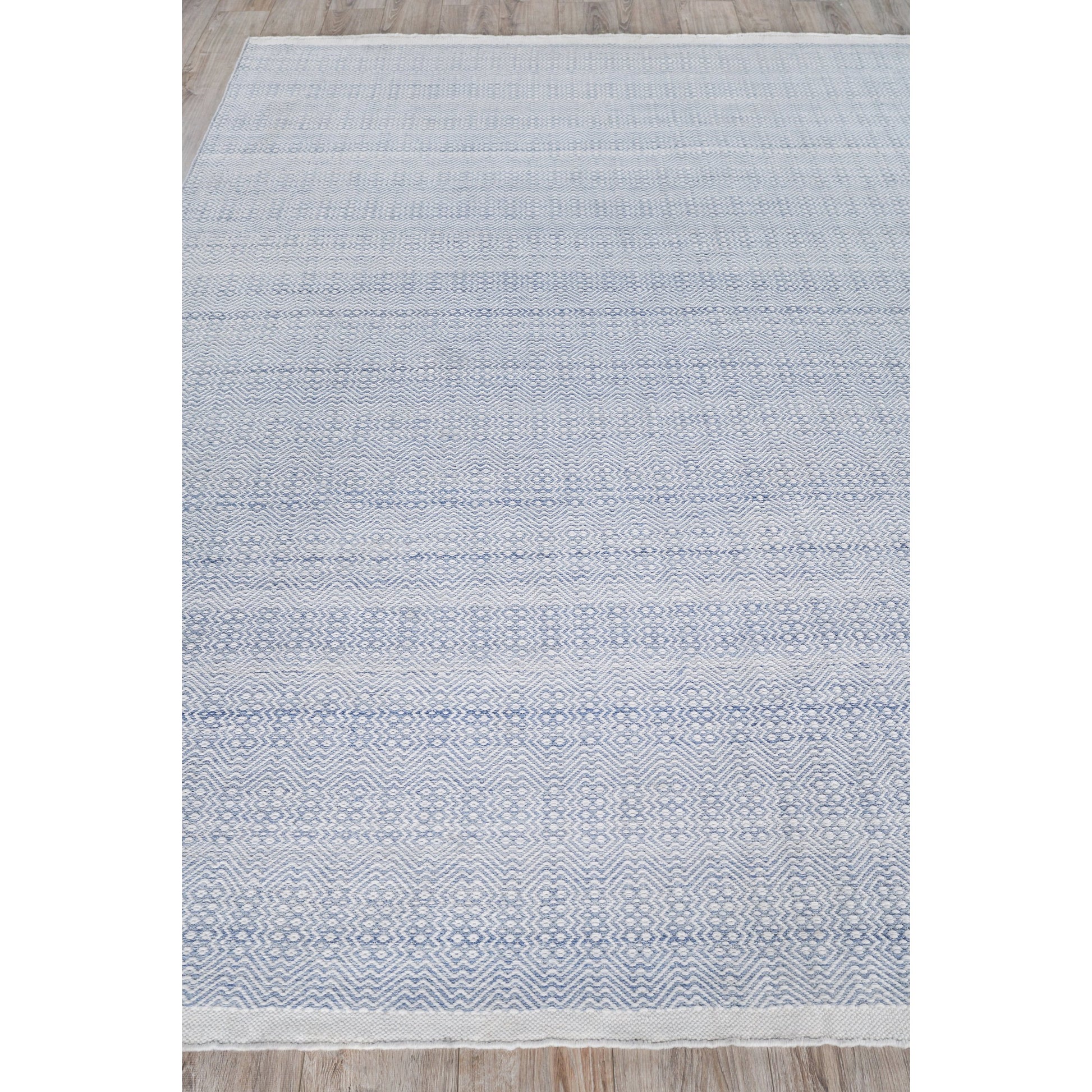 Echo Rug by Exquisite Rugs. Made from pet yarn in a unique style.