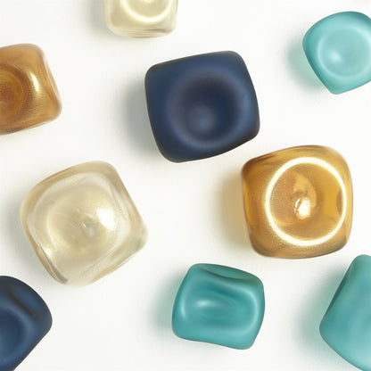 Wall Rocks by Global Views. Made from glass in a coastal style.