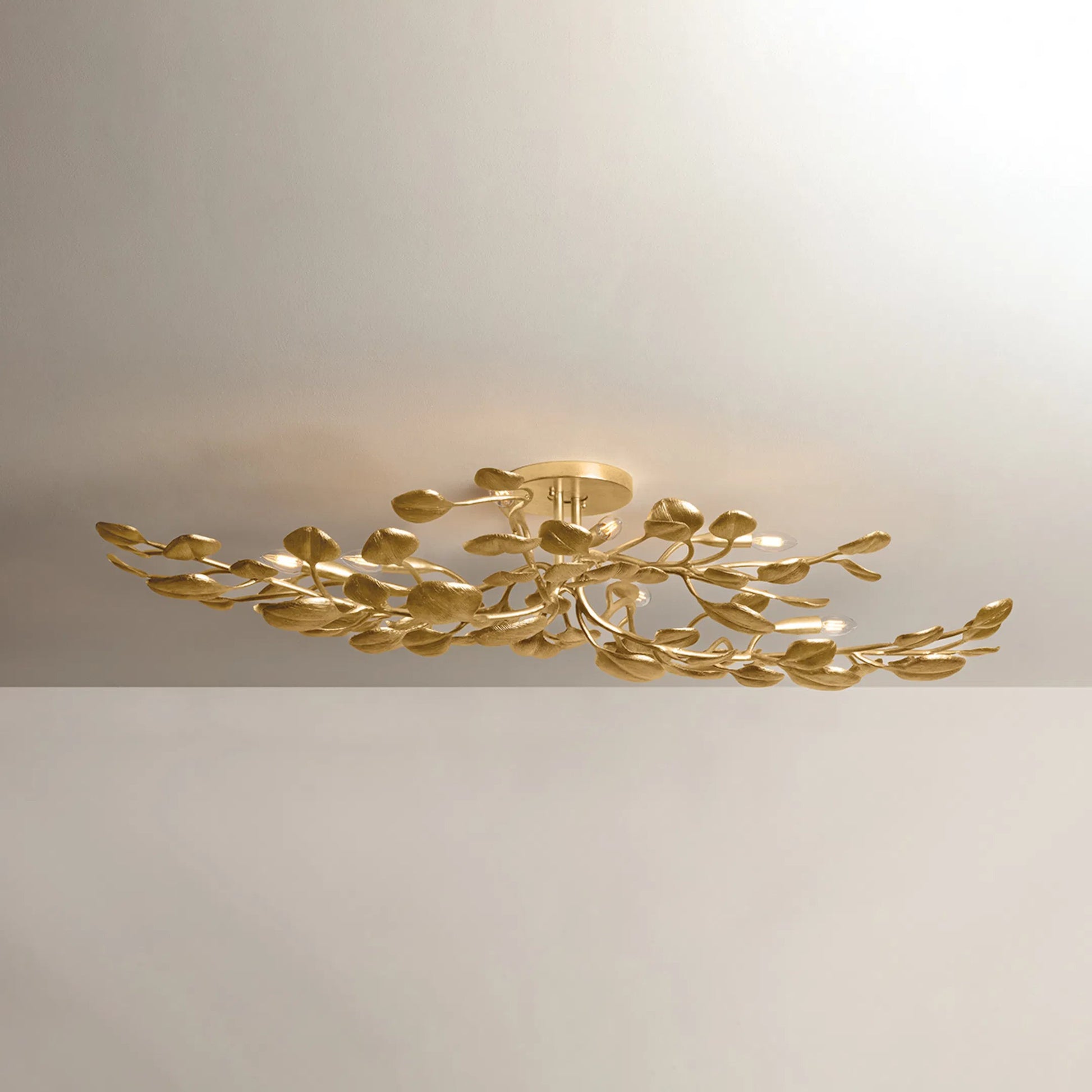 Menorca Semi Flush by Corbett in vintage gold leaf. Made from iron in a modern style.