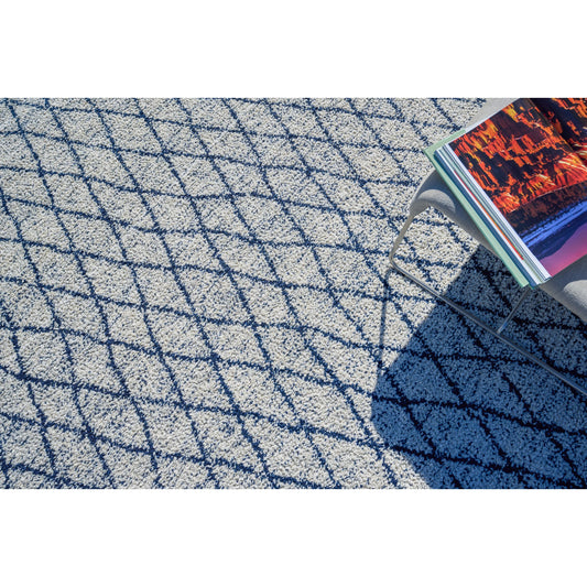 Giorgio 4995 Rug by Exquisite Rugs in navy, ivory. Made from p.e.t. yarn in a unique style.