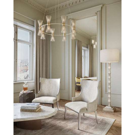 Novatude Chandelier by Currey and Company in contemporary gold leaf, contemporary silver leaf. Made from wrought iron in a modern style.