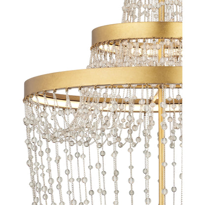 Mademoiselle Chandelier by Currey and Company in contemporary gold leaf, contemporary gold, clear. Made from glass beads, wrought iron in a unique style.