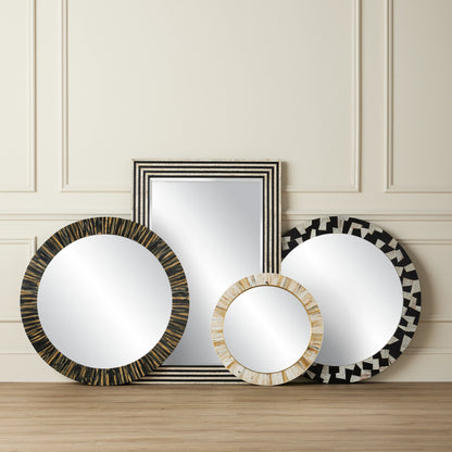 Niva Round Wall Mirror by Currey and Company in cream, brass, mirror. Made from composite, brass, glass, engineered hardwood in a modern style.